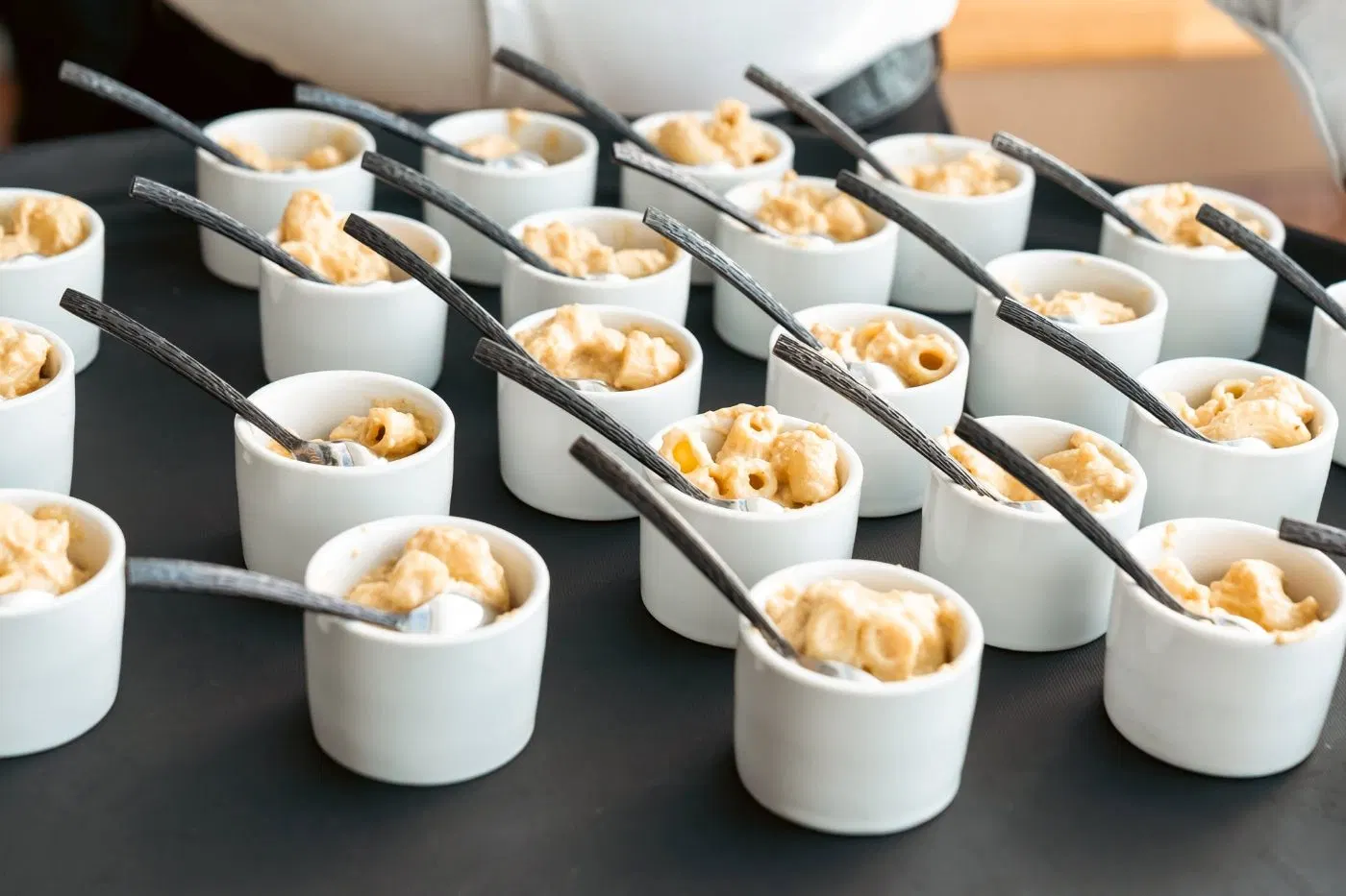 Macaroni tasting cups lined up for service