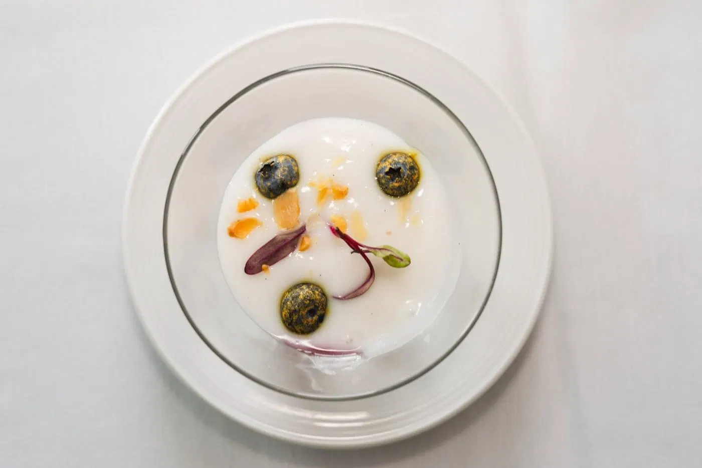 Coconut panna cotta topped with fruit