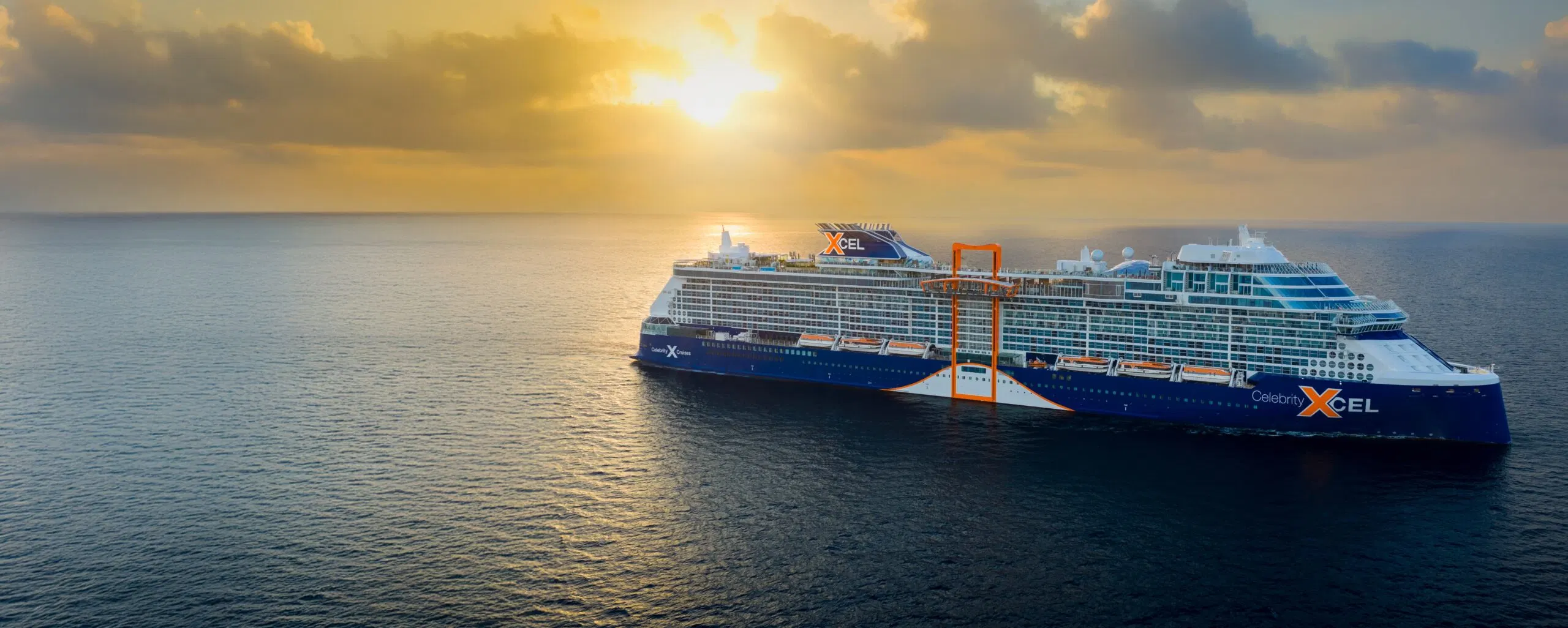 Celebrity Xcel at sea at sunset