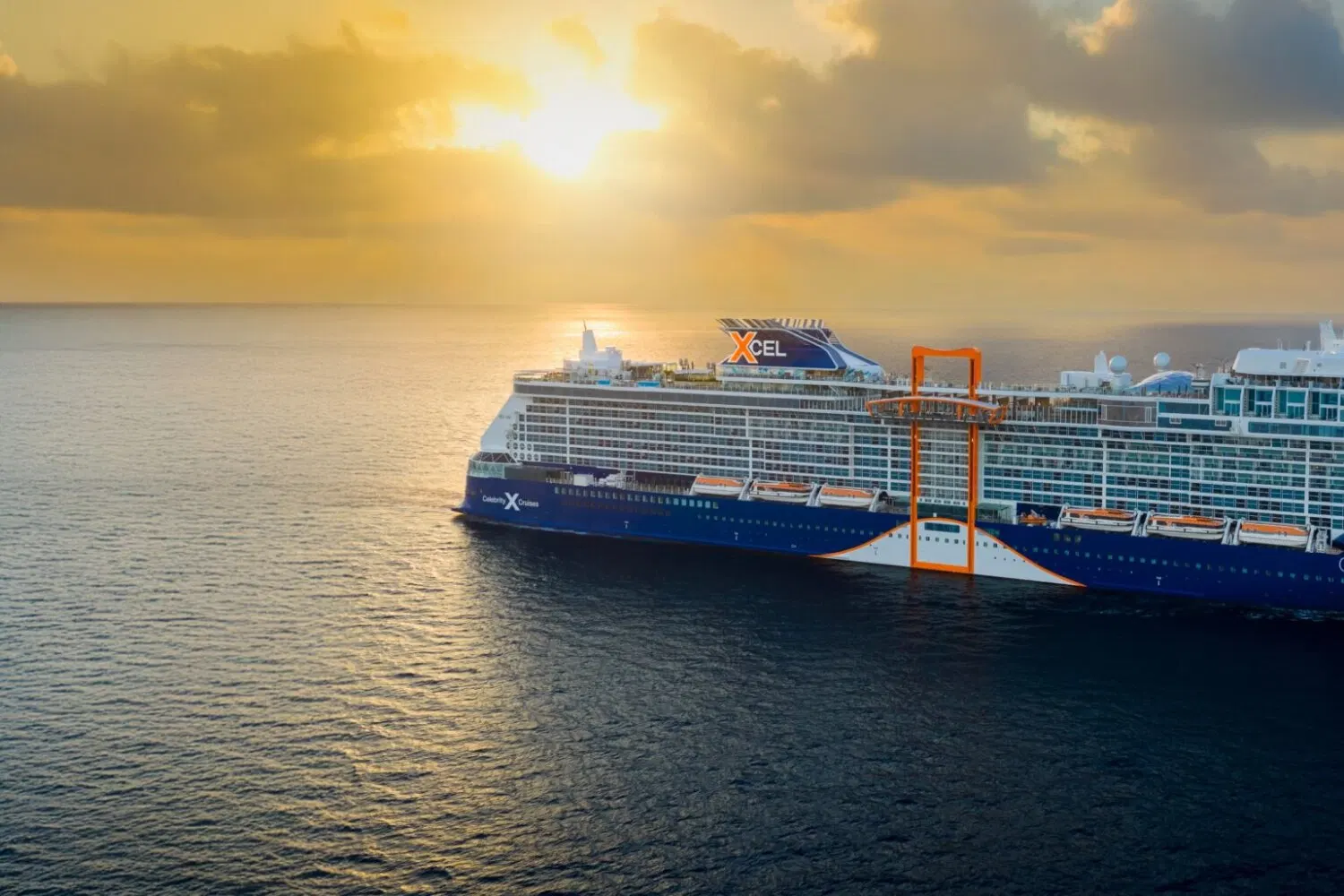 Celebrity Xcel at sea at sunset